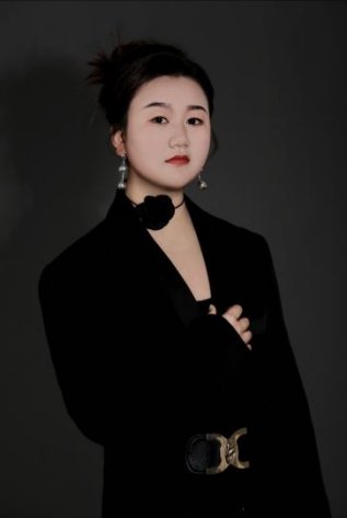 吉...